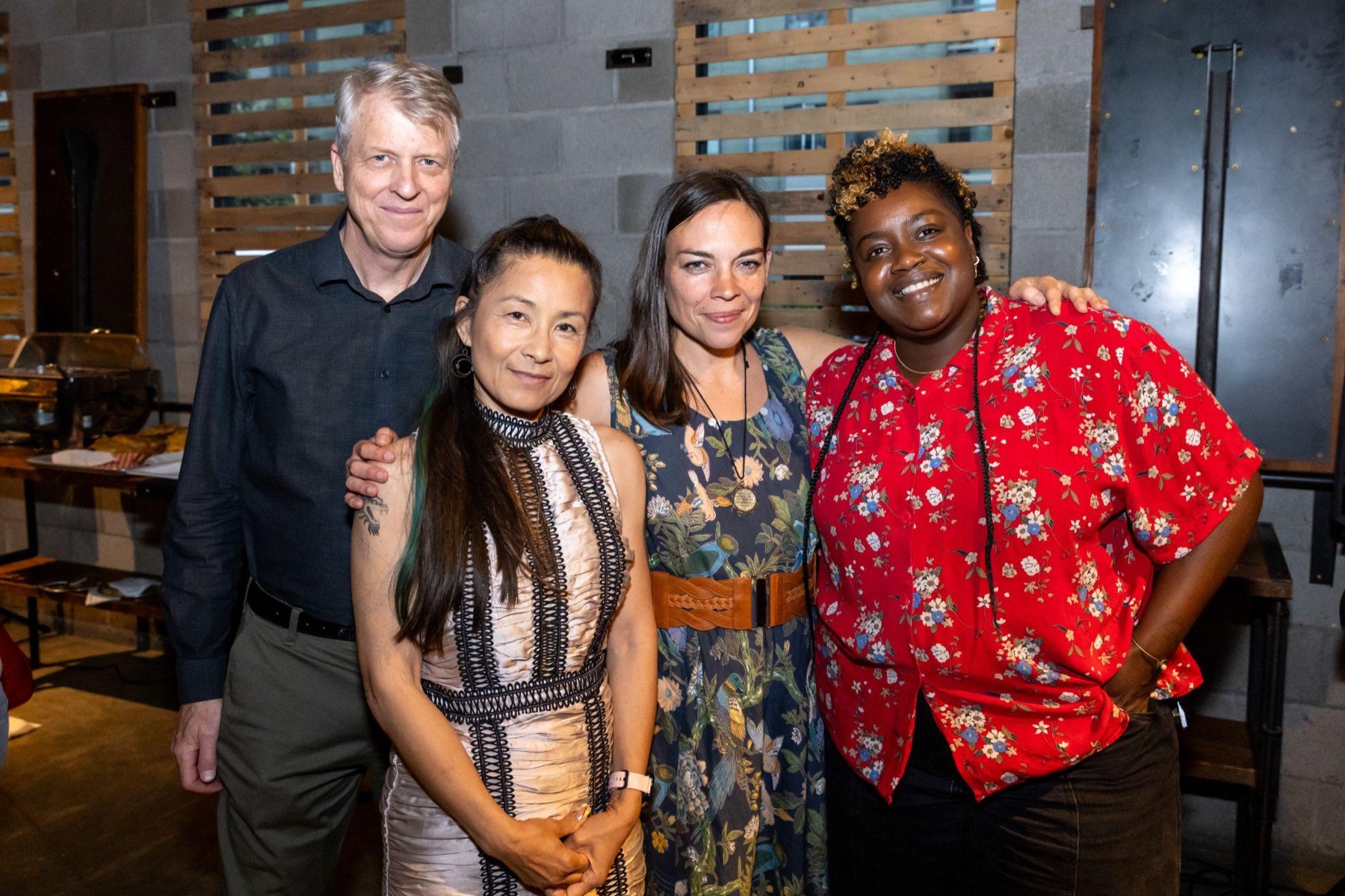 Jora Trang with community members and colleagues